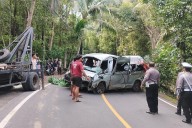 A minibus carrying Chinese tourists  crashes in Bali, killing 5 passengers