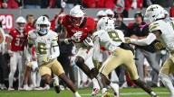 Will NC State pay Georgia Tech after storming field? ACC policy