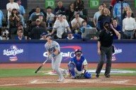 Baseball-Dodgers rally late to repeat as World Series champions