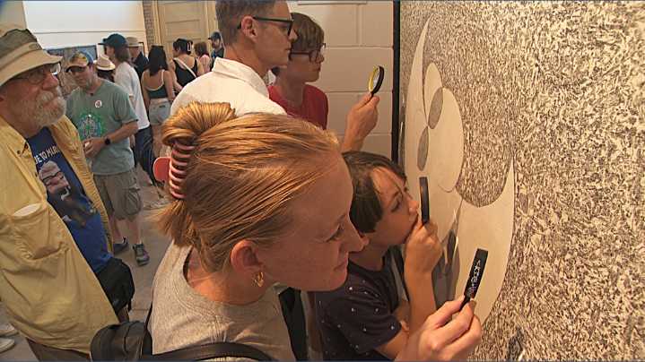 People captivated by hidden messages in Minneapolis artist's work