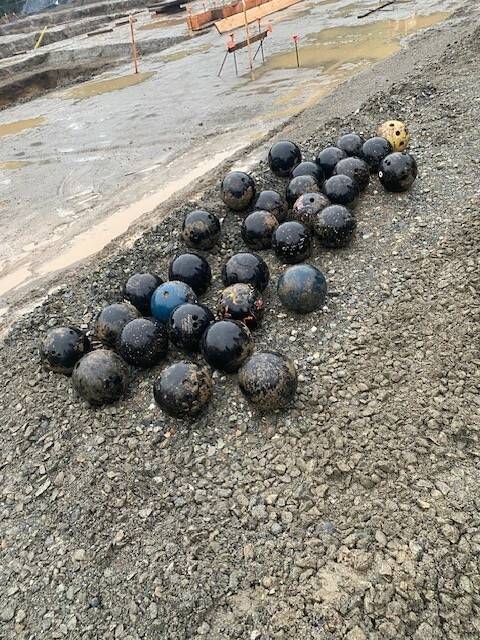 Surprise bowling ball trove unearthed at pool site