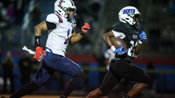 What NC football standouts are climbing the recruiting ladder in Round 2?