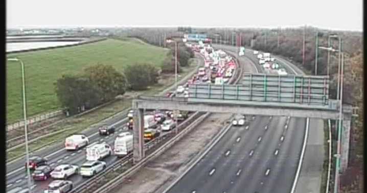 M60 LIVE: All traffic STOPPED on motorway after vehicle overturns in crash