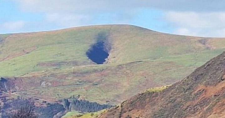 Massive 'hole' in mountain baffles locals with some saying it's 'Devil's bumhole'