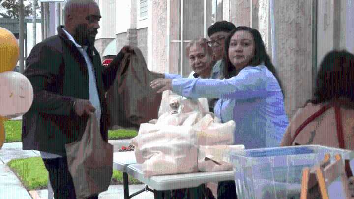 Neighbors helping neighbors: Bellflower boutique holds food giveaway