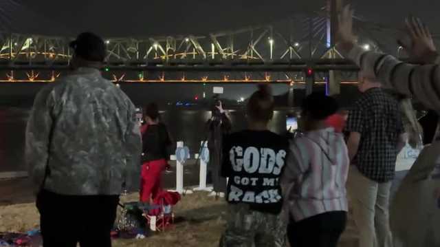 Louisville community comes together for UPS plane crash vigil at Waterfront Park