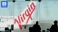 Virgin and Qantas to ban use of portable power banks after string of fires