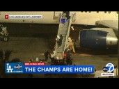 Dodgers return to LA as repeat World Series Champions