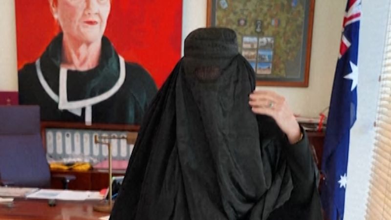 Far-right politician sparks outrage for wearing burqa as political prop