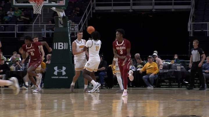 Cox, Colgate Stun Saints at Buzzer