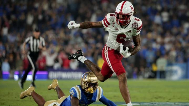 Lateef's impressive debut as a starter and Johnson's rushing lead Nebraska over UCLA 28