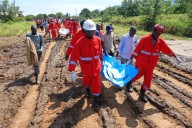 Kenyan landslide death toll rises to 26 as  flash floods hamper search for survivors