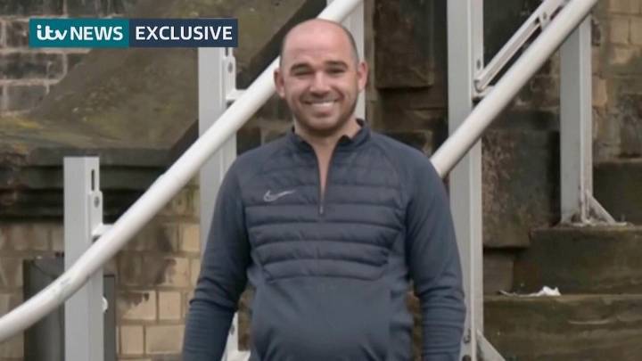 Mistakenly released UK prisoner turns himself in as search continues for second freed convict