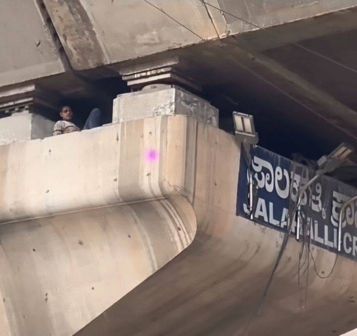 Internet stunned as man found napping inside flyover pillar in Bengaluru