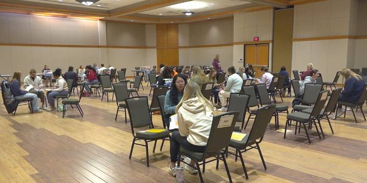 UNI students learn about low-income families with poverty simulation