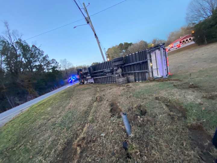 Semi Truck Overturns After Driver Falls Asleep at Wheel