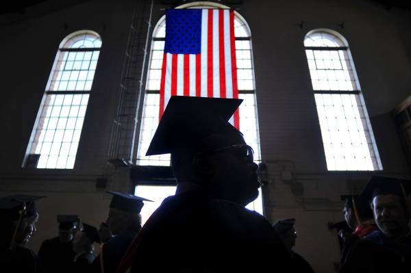 Public workers could be denied loan forgiveness if cities defy Trump, lawsuit alleges