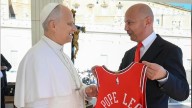 Pope Leo XIV receives a Chicago Bulls jersey from sportcaster Chuck Swirsky