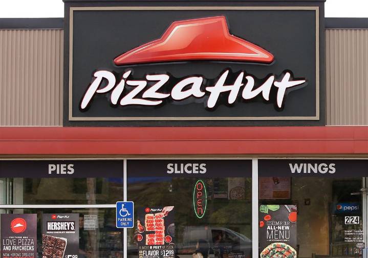 Pizza Hut's parent company says it's considering selling the chain