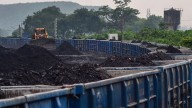 India trims coal production amid power demand falls and stocks swell