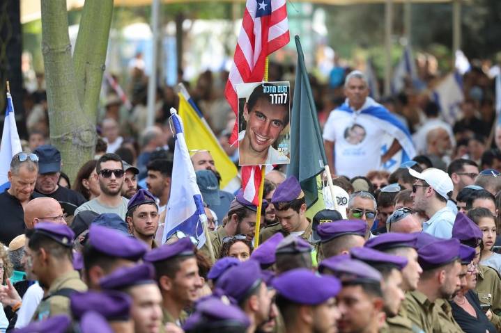 Tens of thousands of Israelis attend funeral of soldier whose remains were held in Gaza for 11 years