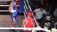 Boxer throws water bottle at referee
