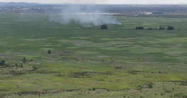 Fire in Hexham Swamp after lightning storm, firefighters on scene