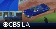 Ice Cube rolls into Dodger Stadium in style with World Series trophy
