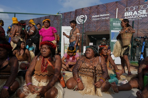 Protesters block the main entrance to COP30 climate talks in Brazil