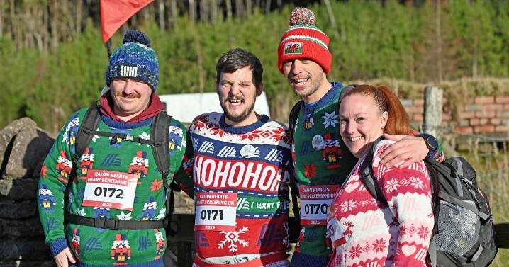 Hundreds of Santas climb Pen y Fan for a good cause