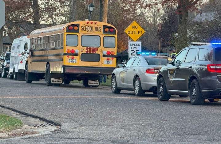 OSP: Niles School bus transporting students clips car