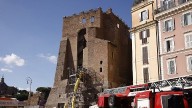 Worker trapped for 11 hours after collapse of medieval tower in central Rome