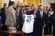 Dodgers urged to skip White House visit over immigration crackdown