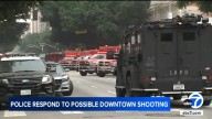 LAPD surrounds downtown apartment building after reported shooting