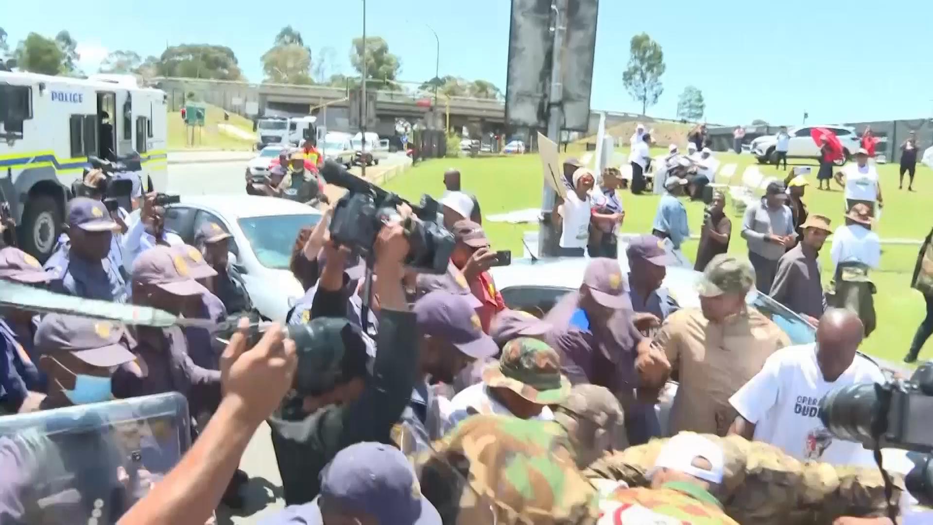 Police clash with protesters in Soweto, near G20 summit venue, arrest two