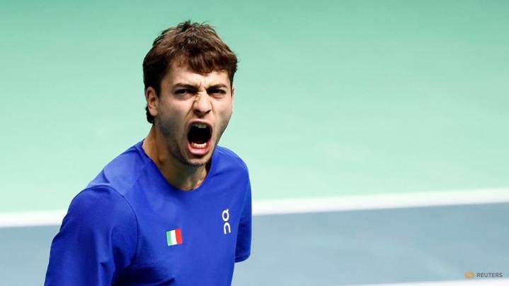 Battling Cobolli sends holders Italy into Davis Cup final