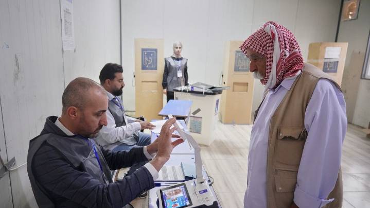 Iraq's displaced Yazidis and security forces cast ballots in early voting in parliament election