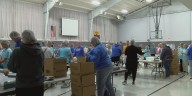 Blue Grass Church and Feed My Starving Children invite local students to feed children in need