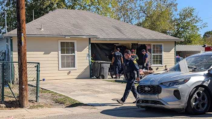 Driver crashes into West Side home after collision at intersection, SAPD says