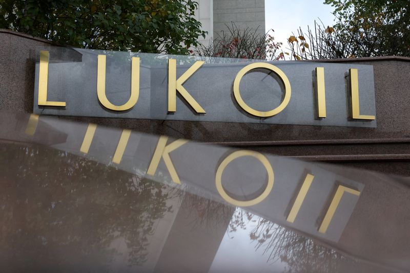 Exclusive-Carlyle exploring options to buy Lukoil foreign assets, sources say