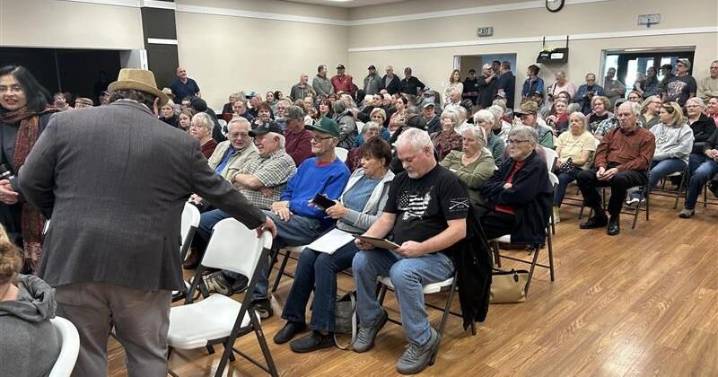 Hospital commissioners address community over massive debt crisis