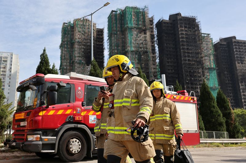 Hong Kong tower fire toll rises to 94 as relatives seek news of missing loved ones