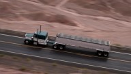Trucks carry uranium ore from Pinyon Plain Mine across Navajo Nation