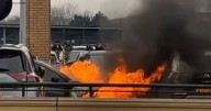 Moment car goes up in flames at Trafford Centre car park