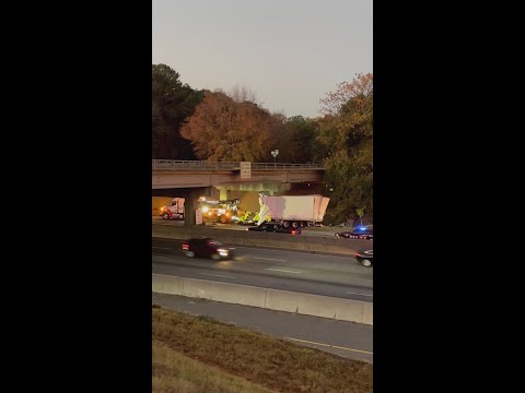 Another truckin angle of an overturned big rig on I