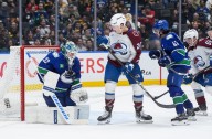MacKinnon nets 5 points as Avalanche beat Canucks 5