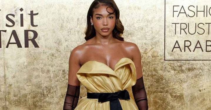 Lori Harvey's Poses in Thigh-High Slit Dress Are So, So Bold