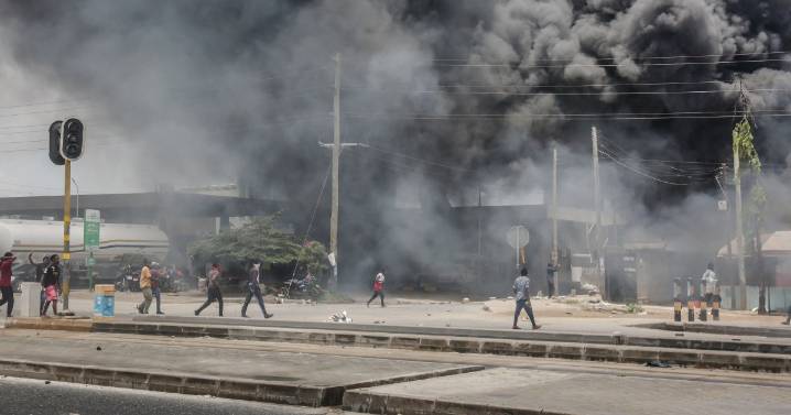 Tanzania charges hundreds with treason and issues arrest warrants for more opposition figures