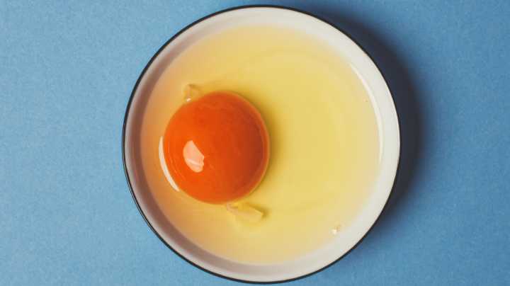 Here's Why There's Stringy White Stuff On Your Egg Yolks