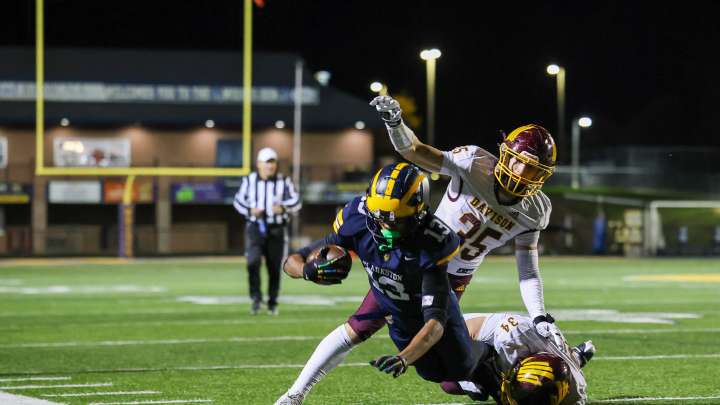 Clarkston's Boman twins dominate Davison to advance in playoffs